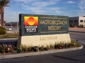 outdoor stone business sign at entryway