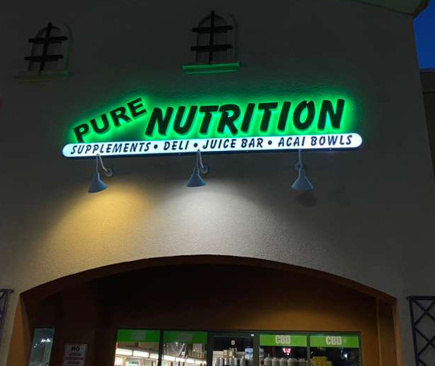 Reverse lit halo pan channel store front lettering