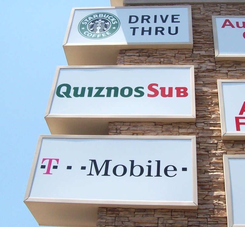 Pylon sign cabinet tenant panel lettering